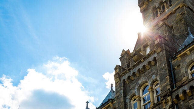 sun flare behind healy hall