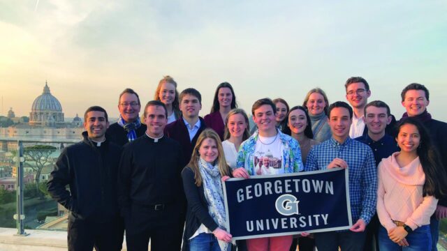 Fourteen sophomore through senior students attend an Ash Wednesday 2019 Mass overlooking Vatican City. Two alumni studying for the priesthood joined the students.