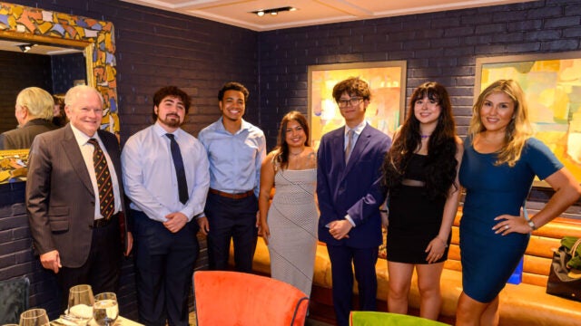 The inaugural class of Stahl Summer Scholars celebrates with Stephen and Shakila Stahl.