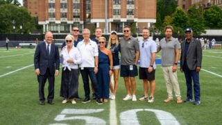 donors on the football field with jack