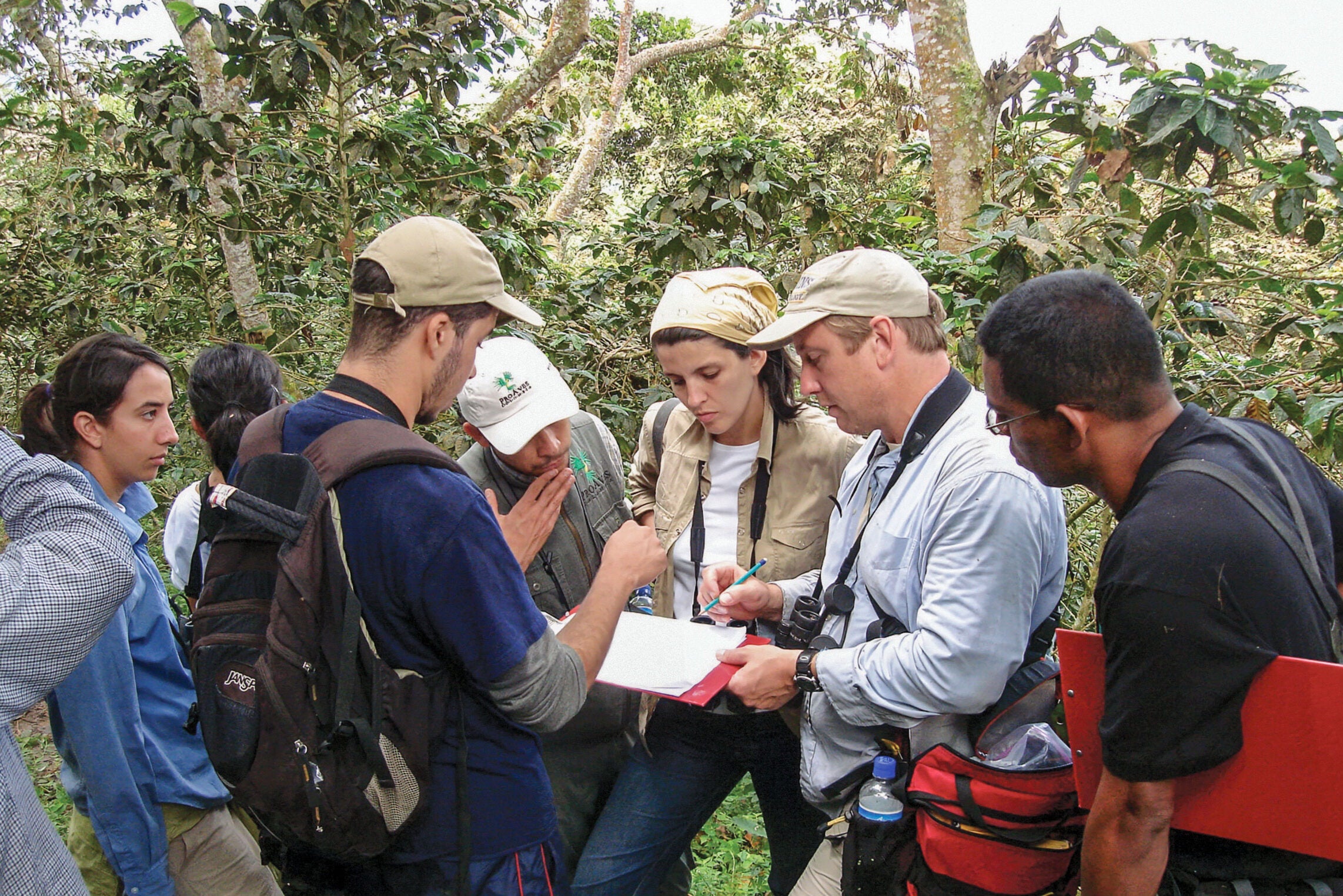 students outside with professor