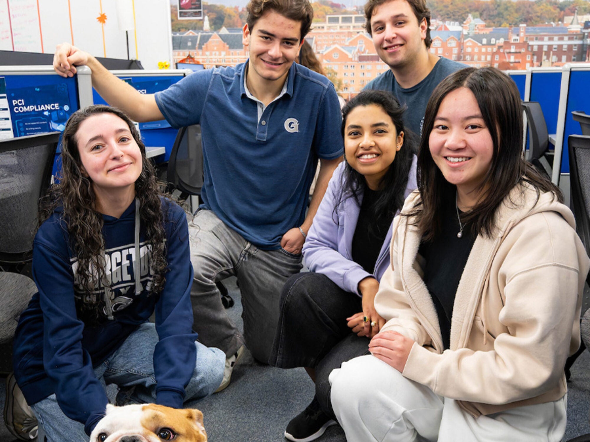 students posing with jack the bulldog