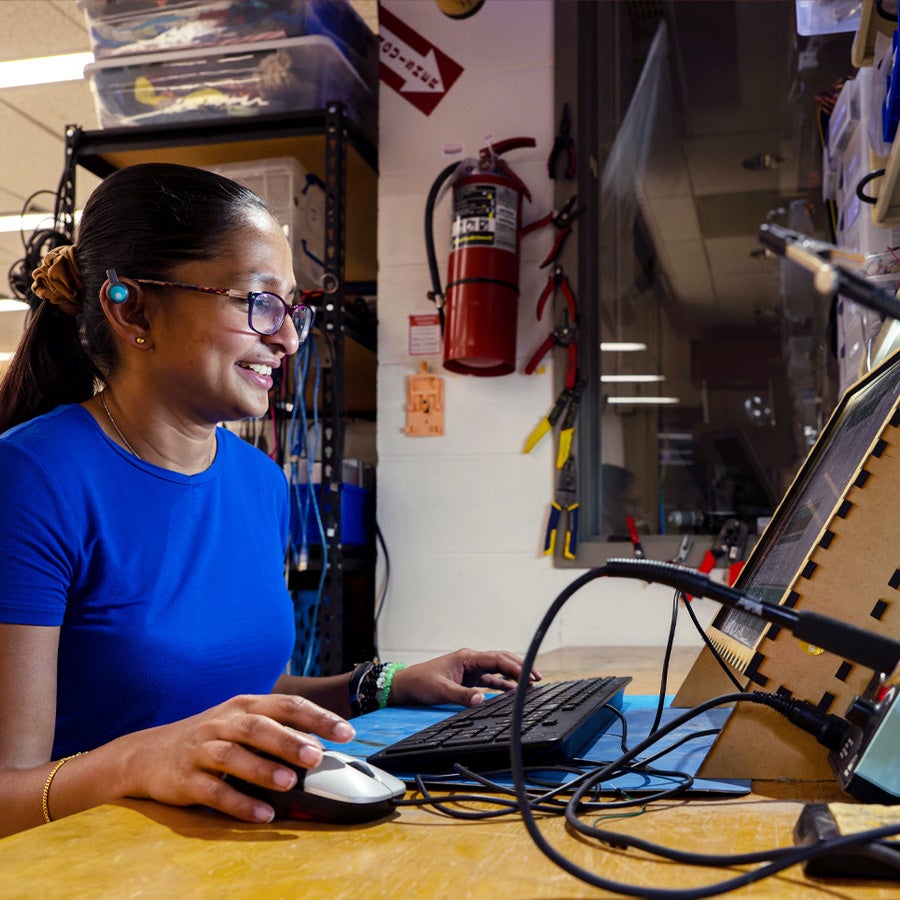 student working on a computer